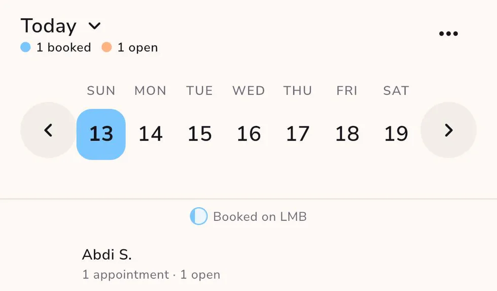 The owner's calendar in the app: today, 1 booked and 1 open, a week strip, and a team member with 1 appointment and 1 open slot.